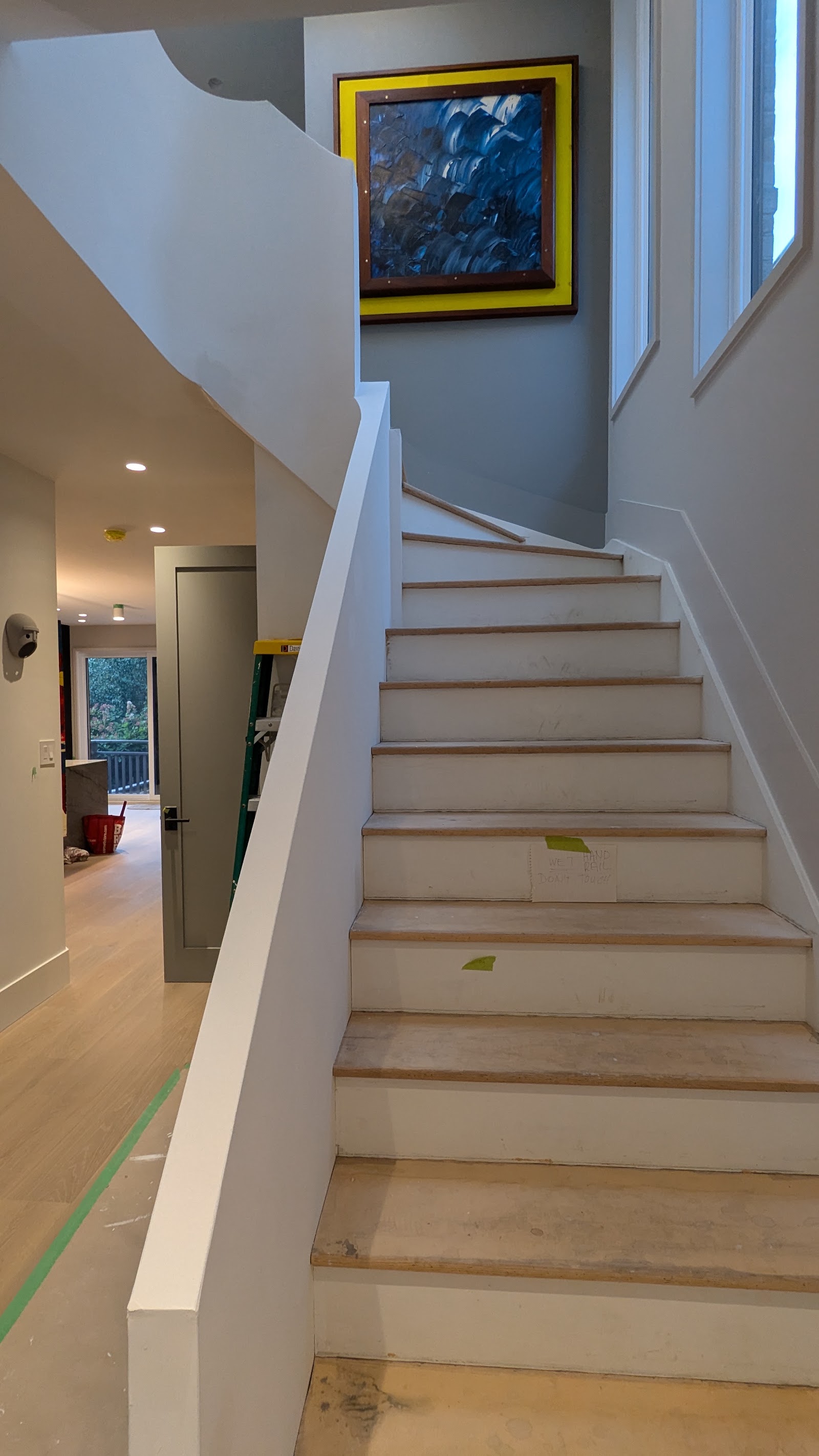 Staircase and hallway finish work in progress